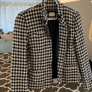 Black and white blazer.
